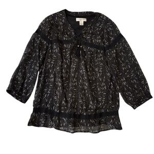 Flowy, bohemian-style black top. Size S